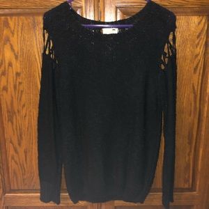 Sweater with cut out sleeves